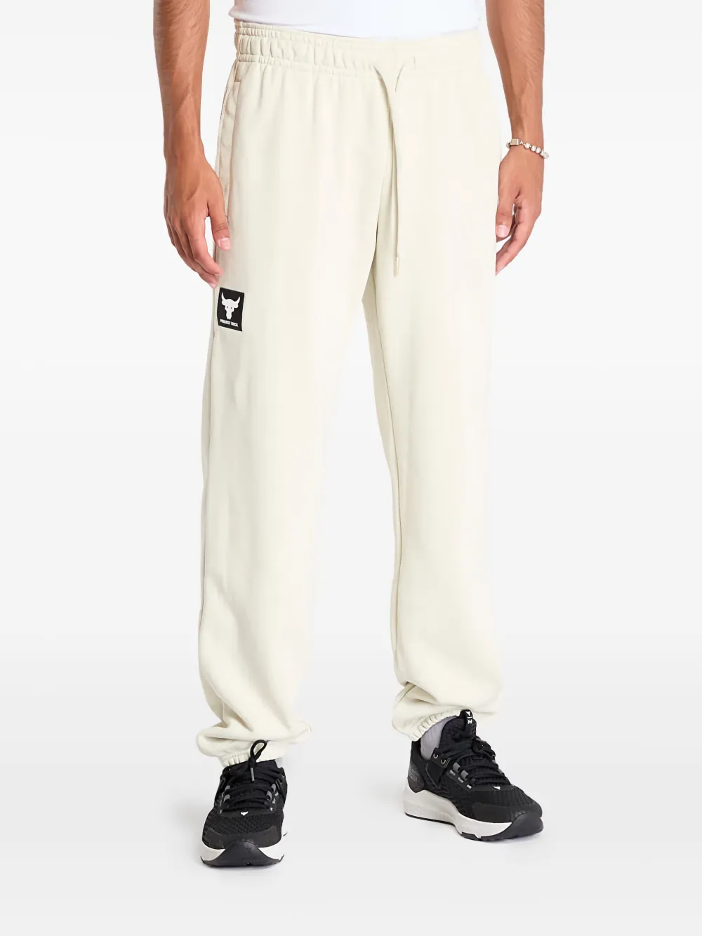 Under Armour Project Rock logo-patch track pants | Neutrals | Image 1