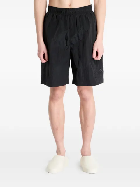 Calvin Klein Jeans logo-embroidered swim shorts