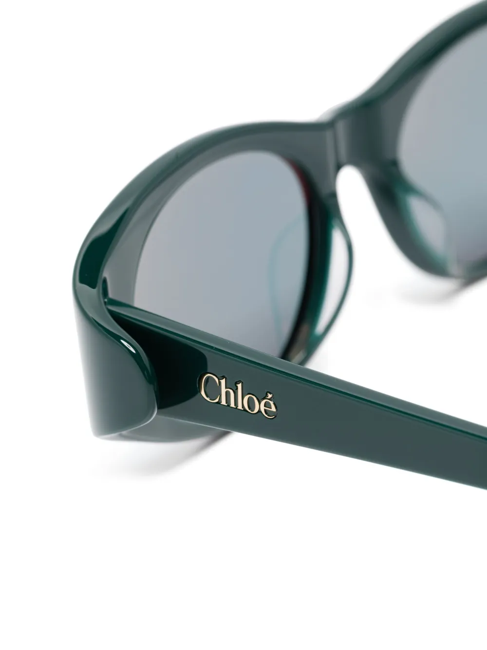Chloé Eyewear Zonnebril met ovalen montuur Groen