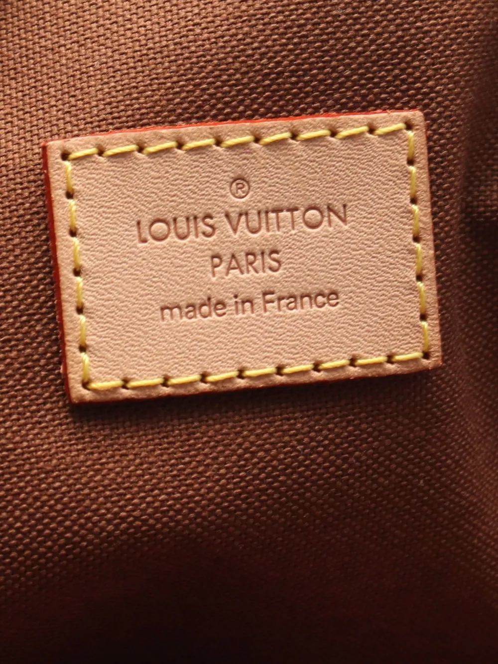 Pre-owned Louis Vuitton 2006 Lockit Handbag In Brown