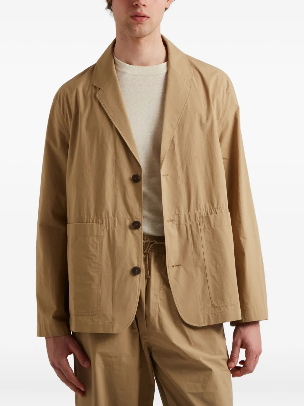 Studio Nicholson three-button patch-pocket jacket Beige