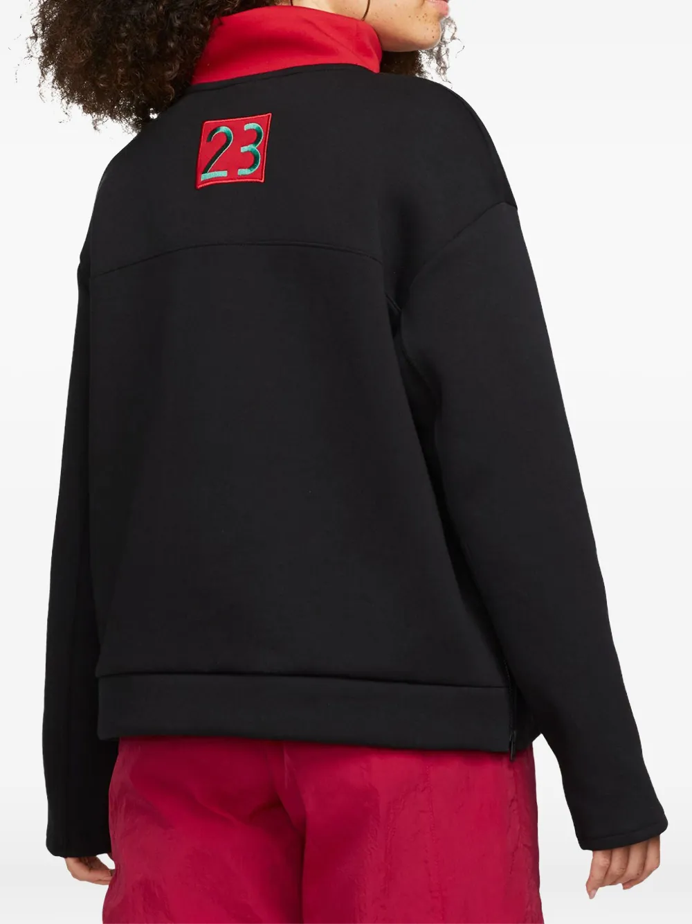 Jordan x Nina Chanel Abney "Black" sweater Zwart