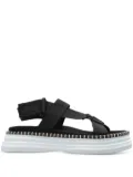 Odissì logo-embroidered sandals - Black