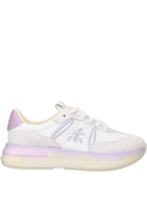 Premiata tenis con parche del logo