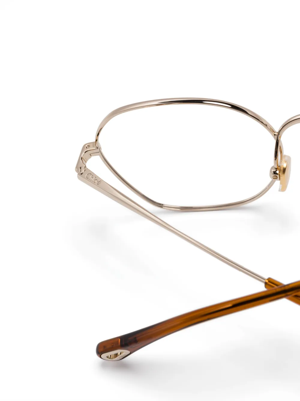 Chloé Eyewear Bril met rond montuur Goud