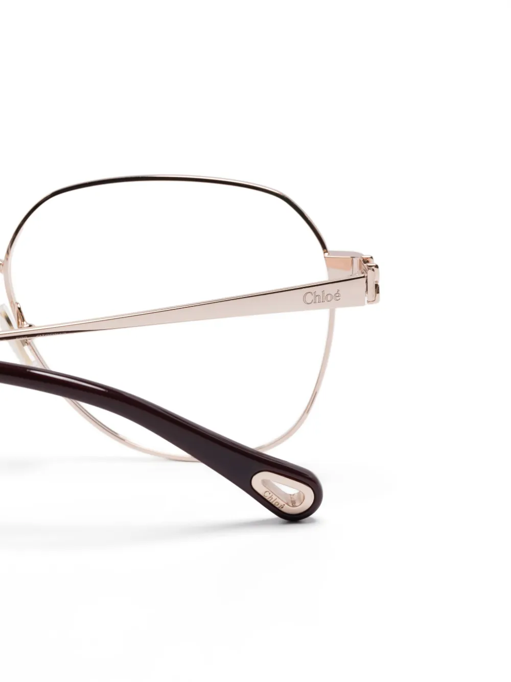 Chloé Eyewear Bril met vlinder montuur Goud