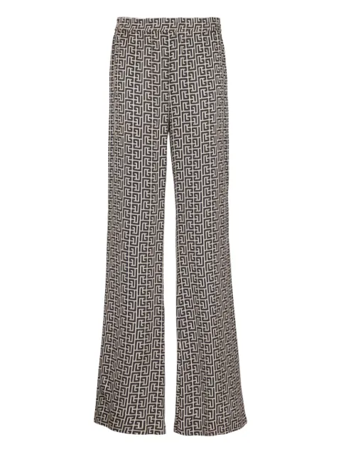 Balmain monogram-pattern trousers