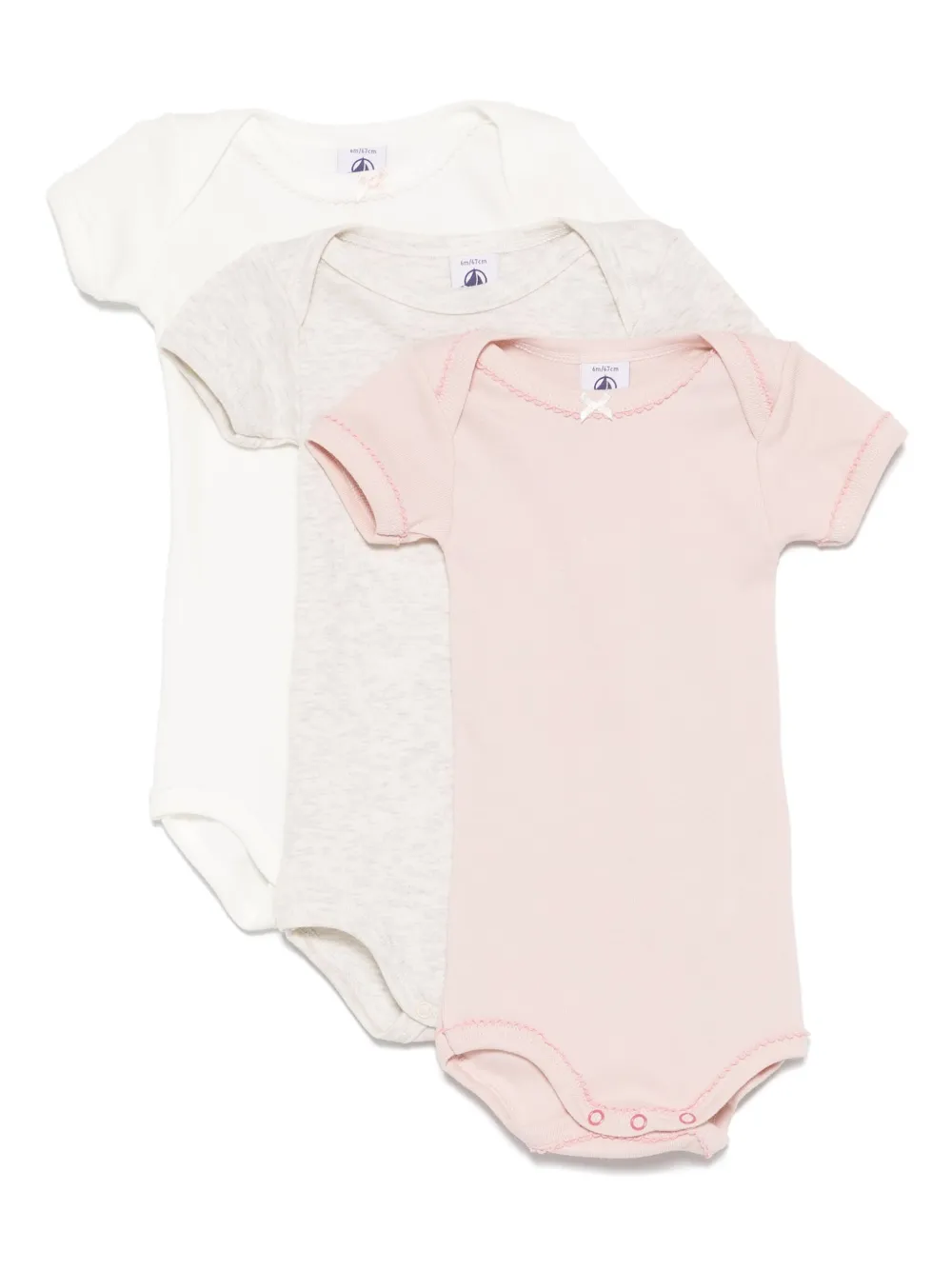 Petit Bateau Drie katoenen rompesr Roze