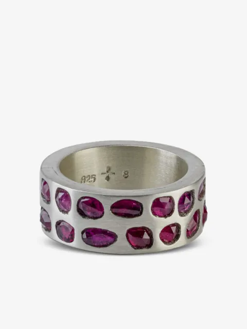 Parts of Four sterling silver Sistema ruby ring