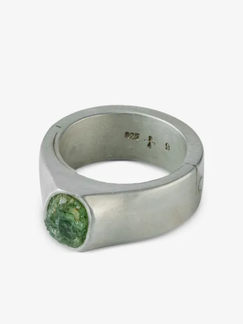 Parts of Four terrestrial surfaced peridot ring
