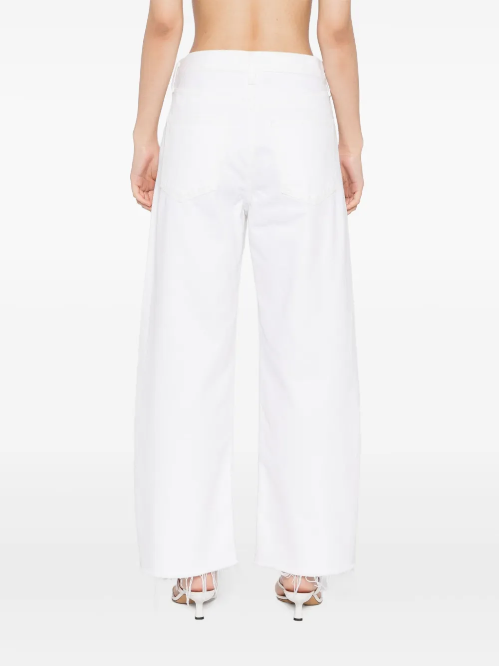 Shop Agolde Low Curve Fray Jeans In White