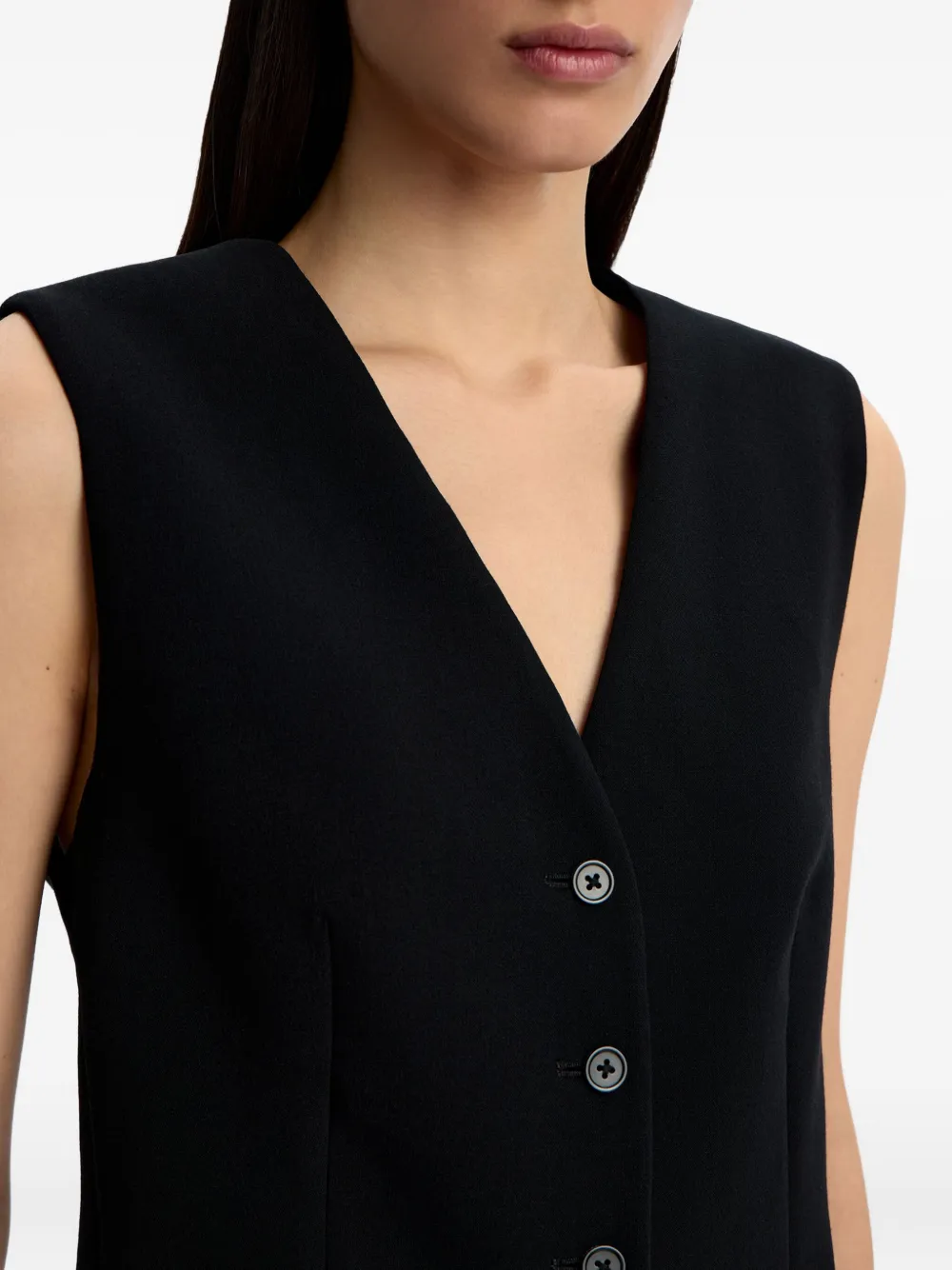 12 STOREEZ Mouwloze spencer met knoopdetail Zwart