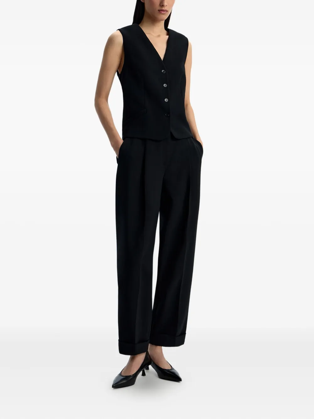12 STOREEZ Mouwloze spencer met knoopdetail Zwart