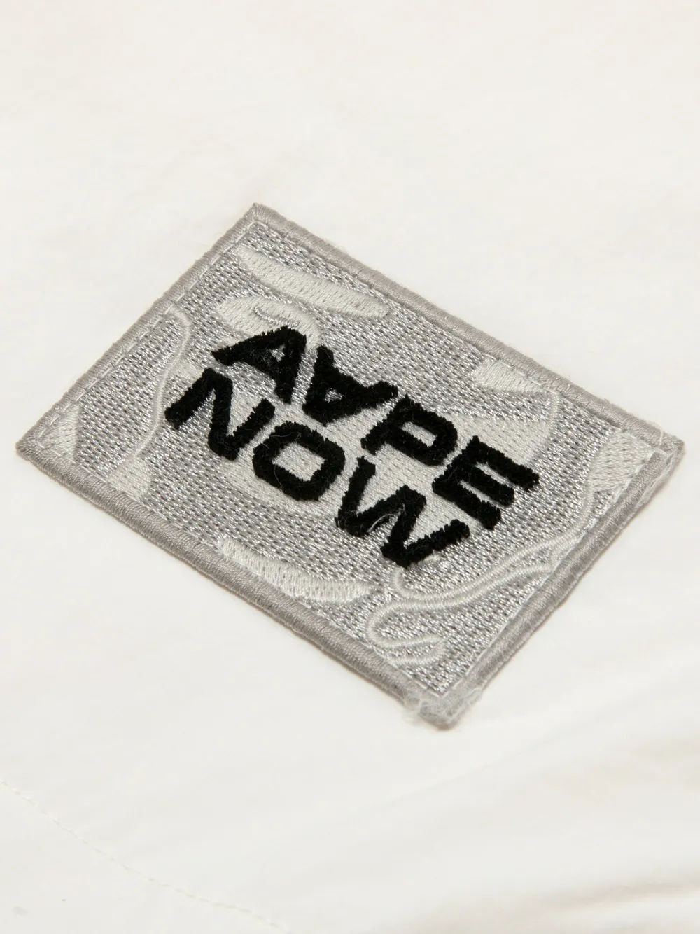 AAPE BY *A BATHING APE Jack met capuchon Wit