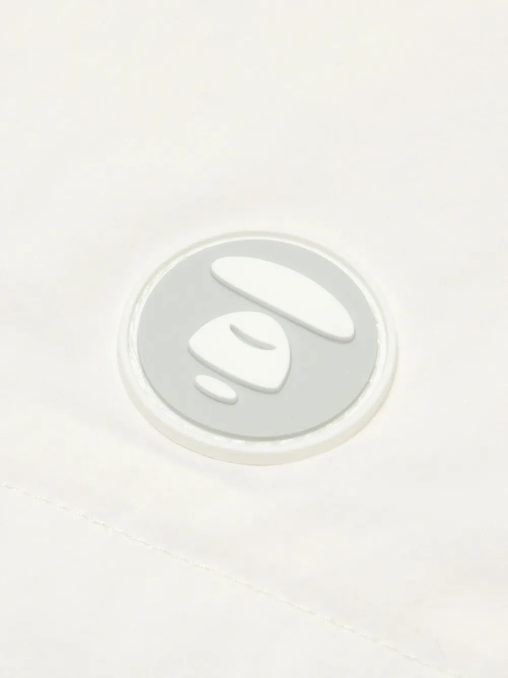 AAPE BY *A BATHING APE Jack met capuchon Wit