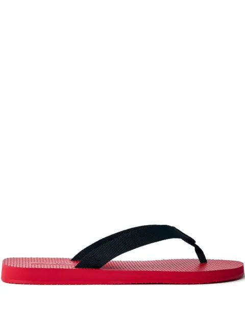 The Row logo slides