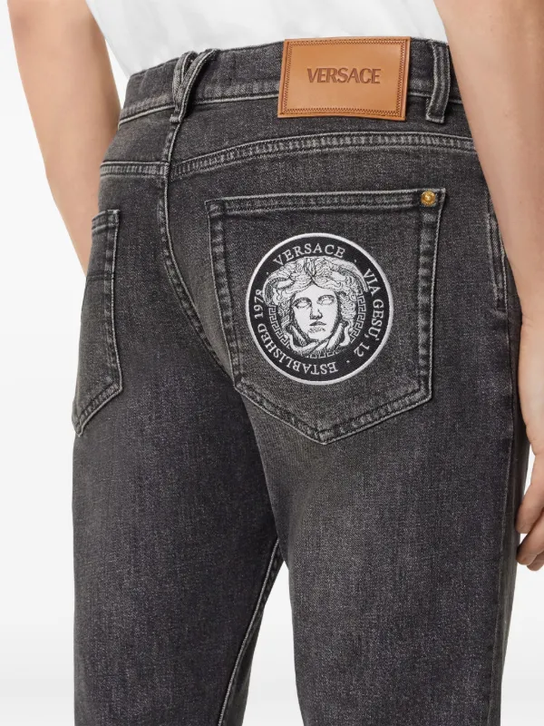 VERSACE ジーンズ VERSACE JEANS メデューサ Versace La Medusa embroidery-detail Jeans | Grey | FARFETCH