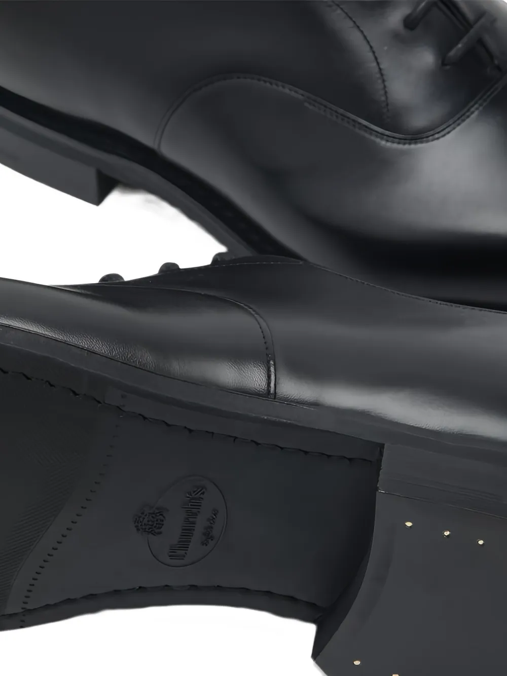 Church's cap-toe leather shoes Black