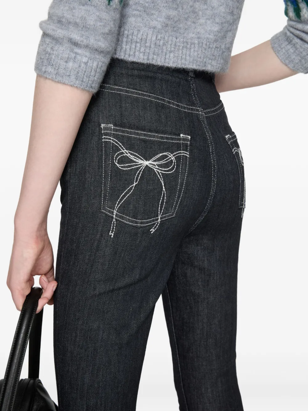 Acne Studios Flared broek met strik Zwart