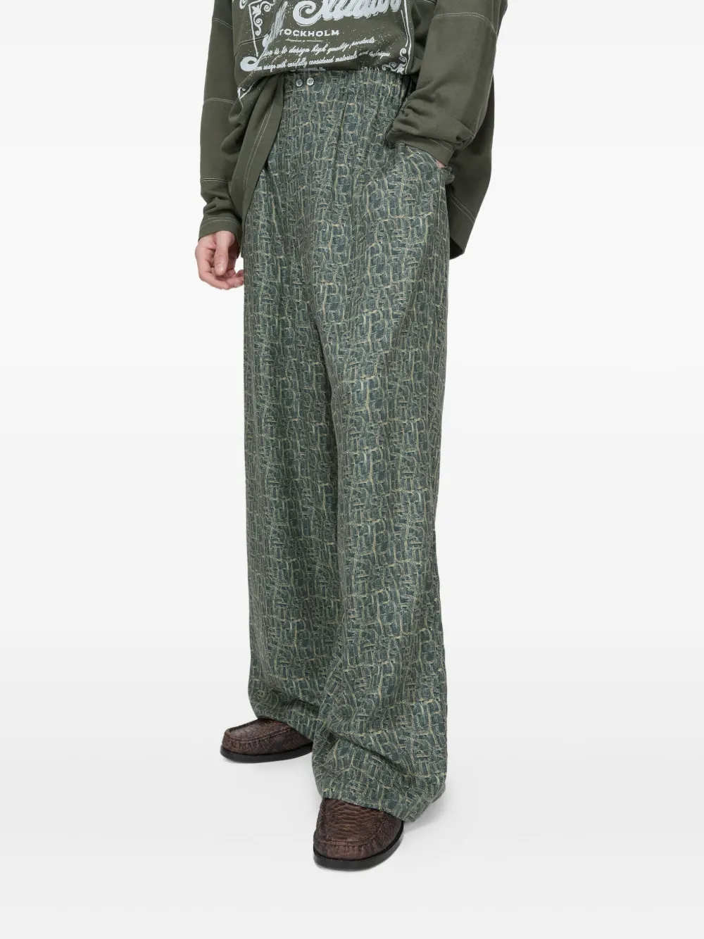 Acne Studios Trainingsbroek met abstracte print Groen