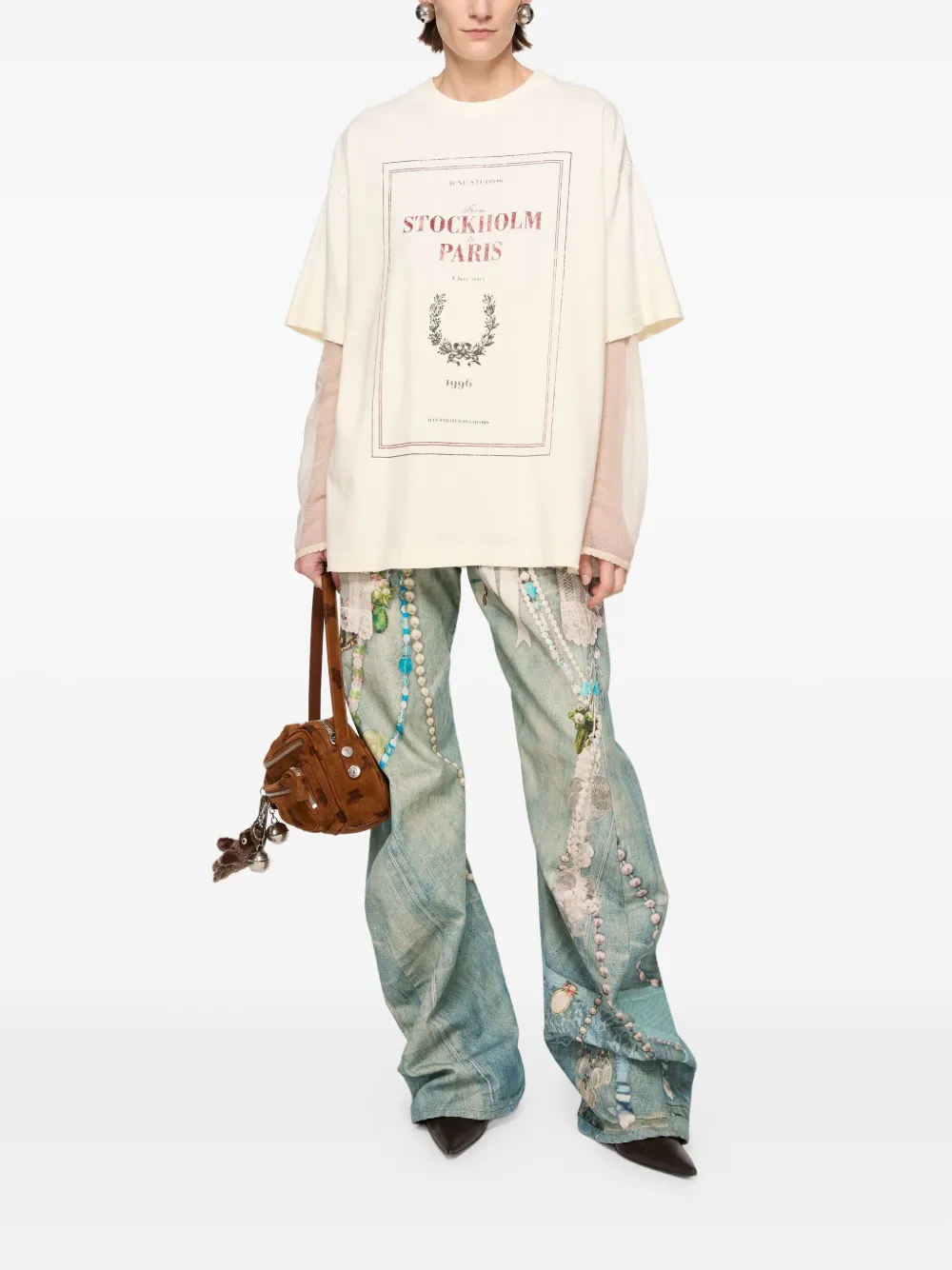 Acne Studios Katoenen jeans met ketting van kant - Blauw