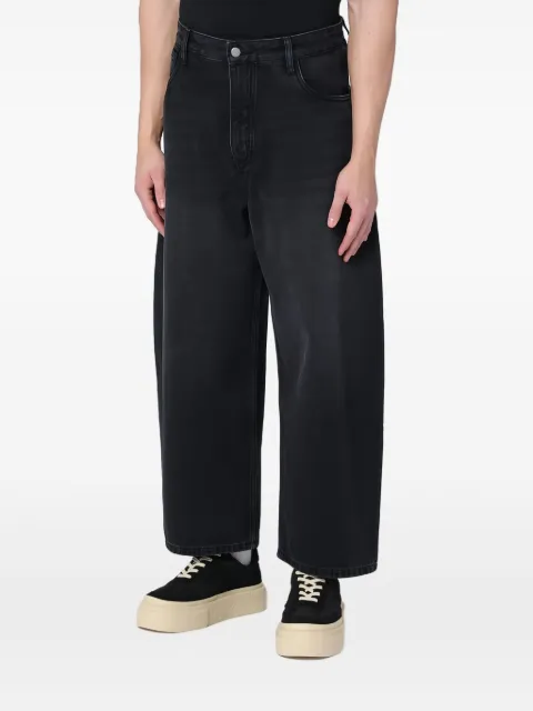 Studio Nicholson pantalones con parche del logo