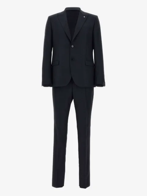 Manuel Ritz traje con botones