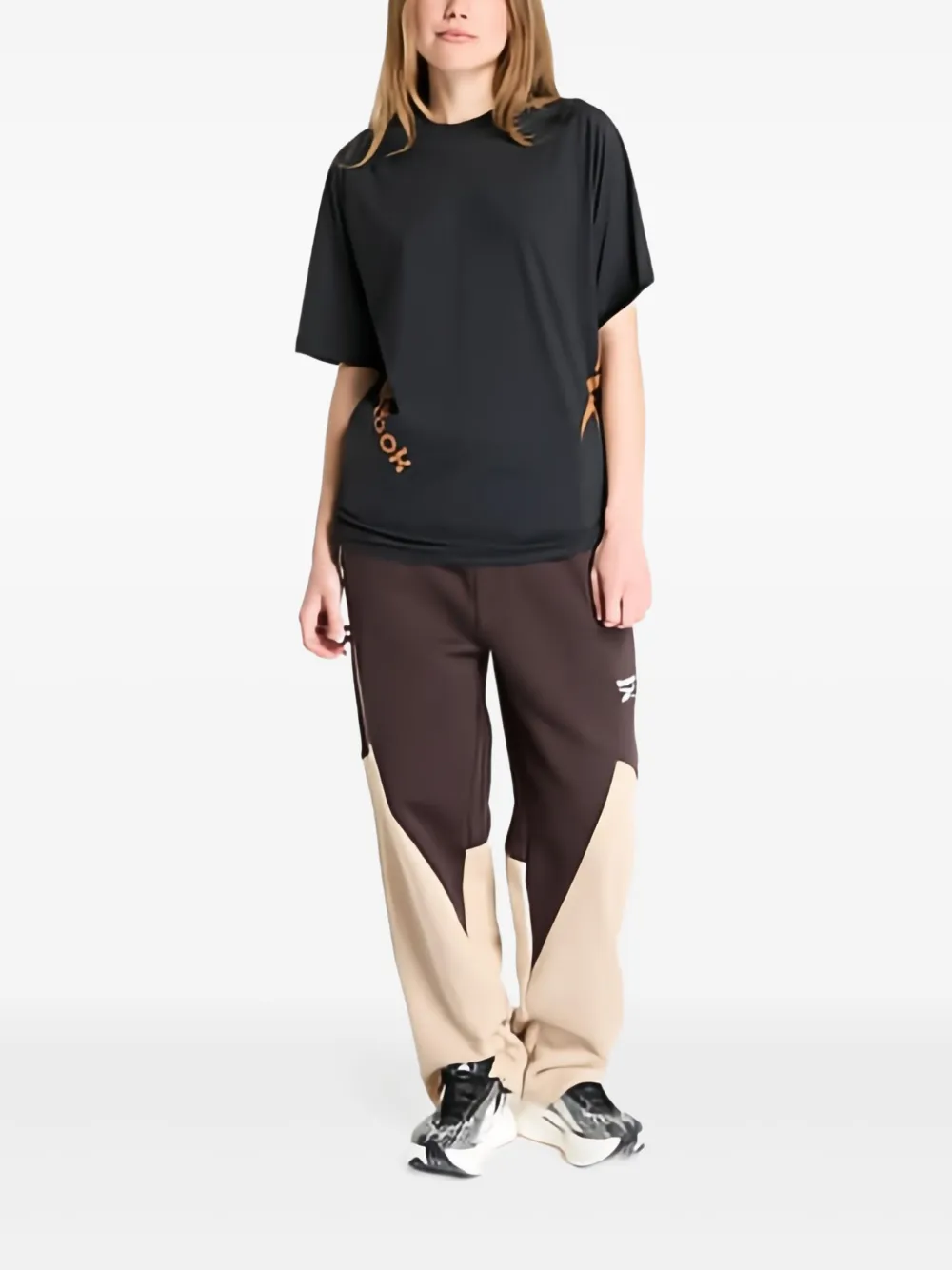 Reebok Broek met wijde pijpen Bruin