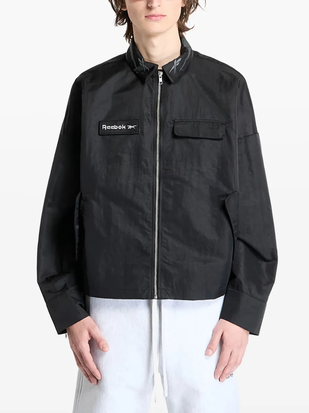 Reebok sobrecamisa con cierre | negro | Image 1