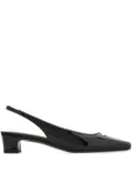 Ferragamo Delightfully unassuming, this demure slingback features an elegant squared tip with a small rectangular cut out that is placed in front o...