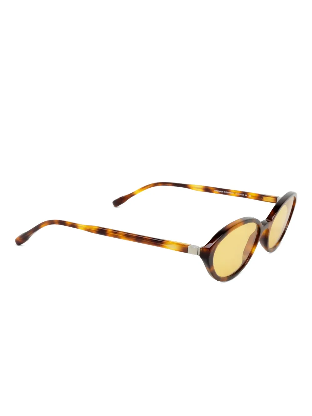 Mykita Zonnebril met ovalen montuur en schildpadschild design Bruin