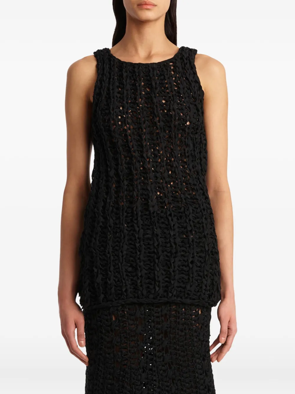 KHAITE Opengewerkte top Zwart