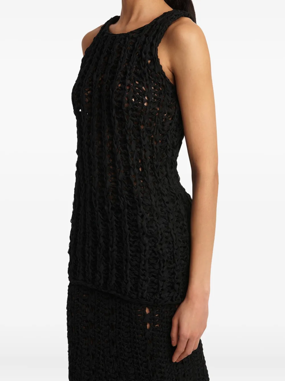 KHAITE Opengewerkte top Zwart