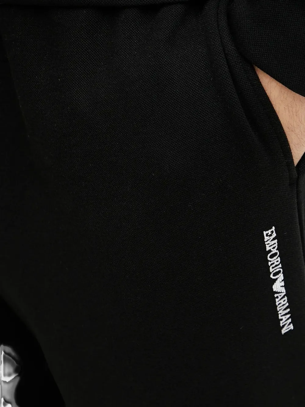 Emporio Armani embroidered-logo cuffed track pants Zwart