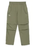 izzue logo-printed pants - Green
