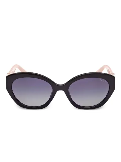 GUESS EYEWEAR lentes de sol con armazón ovalada y logo