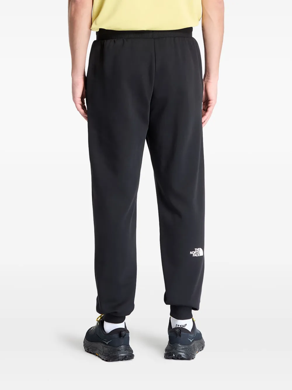 The North Face Joggingbroek met toelopende pijpen en logo Zwart