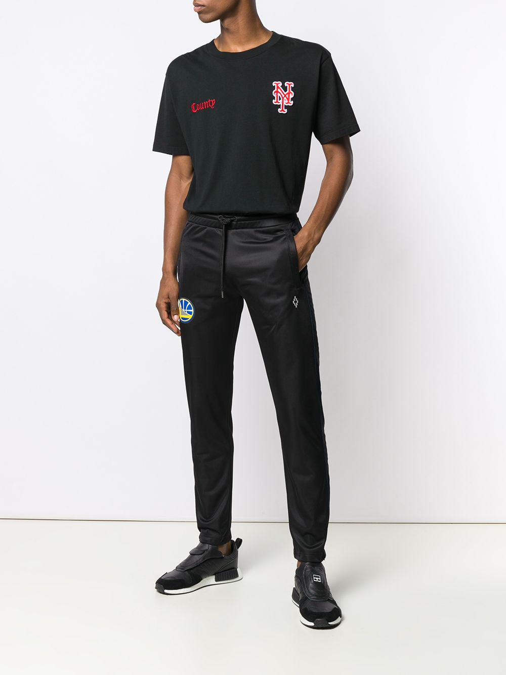 фото Marcelo burlon county of milan спортивные брюки nba