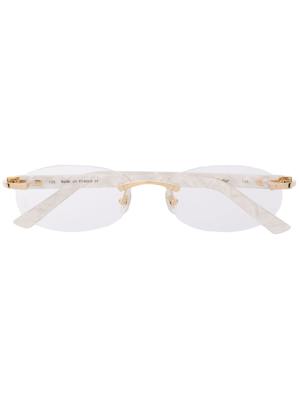 фото Cartier eyewear очки c décor в овальной безободковой оправе