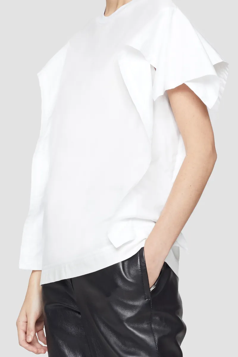 white shirt with ruffle sleeves