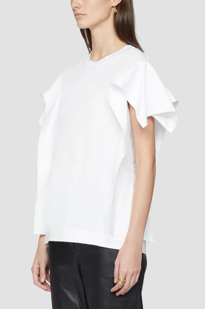 white shirt with frill sleeves