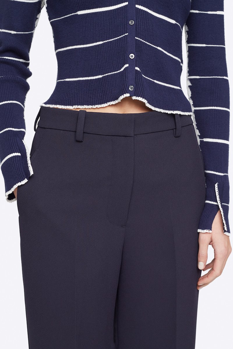 Heavy Cady Relaxed Fit Trouser-blue #1 Heavy Cady Relaxed Fit Trouser, Time to upgrade your office attire game. Cut with a straight fit, these midnight blue trousers from 3.1 Phillip Lim are the perfect choice for an instantly put-together look. Level up. Featuring a high waist, belt loops, a concealed front fastening, side slit pockets, back buttoned welt pocket, a straight leg and a long length. POSITIVELY CONSCIOUS: This product is made with a certified eco-material or a recycled material that is better for the planet, so you can be confident you are choosing positively.- 3
