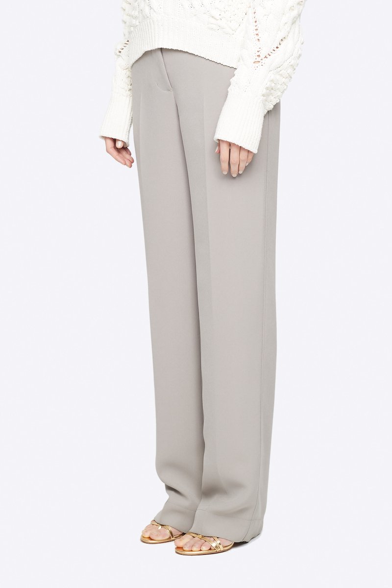 Heavy Cady Relaxed Fit Trouser-grey #1 Heavy Cady Relaxed Fit Trouser, Time to upgrade your office attire game. Cut with a straight fit, these cement grey trousers from 3.1 Phillip Lim are the perfect choice for an instantly put-together look. Level up. Featuring a high waist, belt loops, a concealed front fastening, side slit pockets, back buttoned welt pocket, a straight leg and a long length. POSITIVELY CONSCIOUS: This product is made with a certified eco-material or a recycled material that is better for the planet, so you can be confident you are choosing positively. - 1
