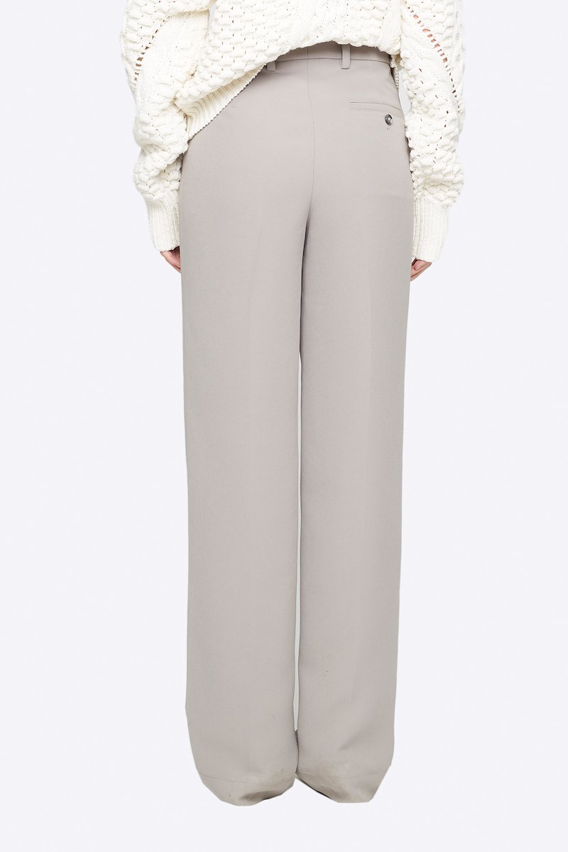 Heavy Cady Relaxed Fit Trouser-grey #0 Heavy Cady Relaxed Fit Trouser, Time to upgrade your office attire game. Cut with a straight fit, these cement grey trousers from 3.1 Phillip Lim are the perfect choice for an instantly put-together look. Level up. Featuring a high waist, belt loops, a concealed front fastening, side slit pockets, back buttoned welt pocket, a straight leg and a long length. POSITIVELY CONSCIOUS: This product is made with a certified eco-material or a recycled material that is better for the planet, so you can be confident you are choosing positively. - 2