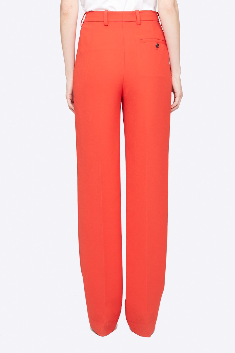 Heavy Cady Relaxed Fit Trouser-orange #0 Heavy Cady Relaxed Fit Trouser, Time to upgrade your office attire game. Cut with a straight fit, these orange trousers from 3.1 Phillip Lim are the perfect choice for an instantly put-together look. Level up. Featuring a high waist, belt loops, a concealed front fastening, side slit pockets, back buttoned welt pocket, a straight leg and a long length. POSITIVELY CONSCIOUS: This product is made with a certified eco-material or a recycled material that is better for the planet, so you can be confident you are choosing positively. - 2
