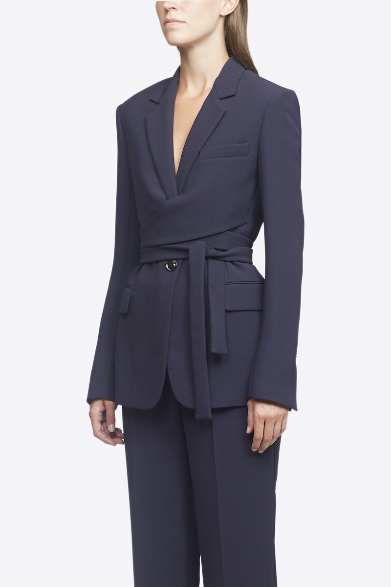 Heavy Cady Wrap Blazer-blue #1 Heavy Cady Wrap Blazer, Thinking about tailoring your wardrobe in a different direction? Smarten up and feel good in 3.1 Phillip Lim's midnight blue wrap blazer jacket, not only because of its sharp design but also thanks to it FSC®Certified triacetate construction. Suits you very well indeed. Featuring notched lapels, a broad welt chest pocket, a tie waist, a front button fastening, flap pockets, a rear central vent and slit cuffs. POSITIVELY CONSCIOUS: This product is made with a certified eco-material or a recycled material that is better for the planet, so you can be confident you are choosing positively. - 1