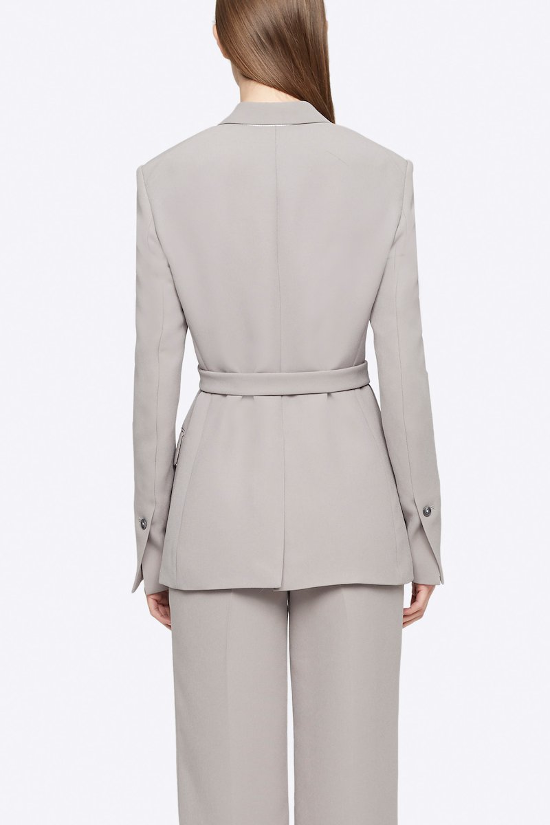 Heavy Cady Wrap Blazer-grey #0 Heavy Cady Wrap Blazer, Grey single-breasted wrap blazer from 3.1 PHILLIP LIM featuring notched lapels, front button fastening, long sleeves, jetted chest pocket, side tie fastening, central rear vent and two front flap pockets. POSITIVELY CONSCIOUS: This product is made with a material widely recognised as being better for the planet, so you can be confident you are choosing positively .- 2