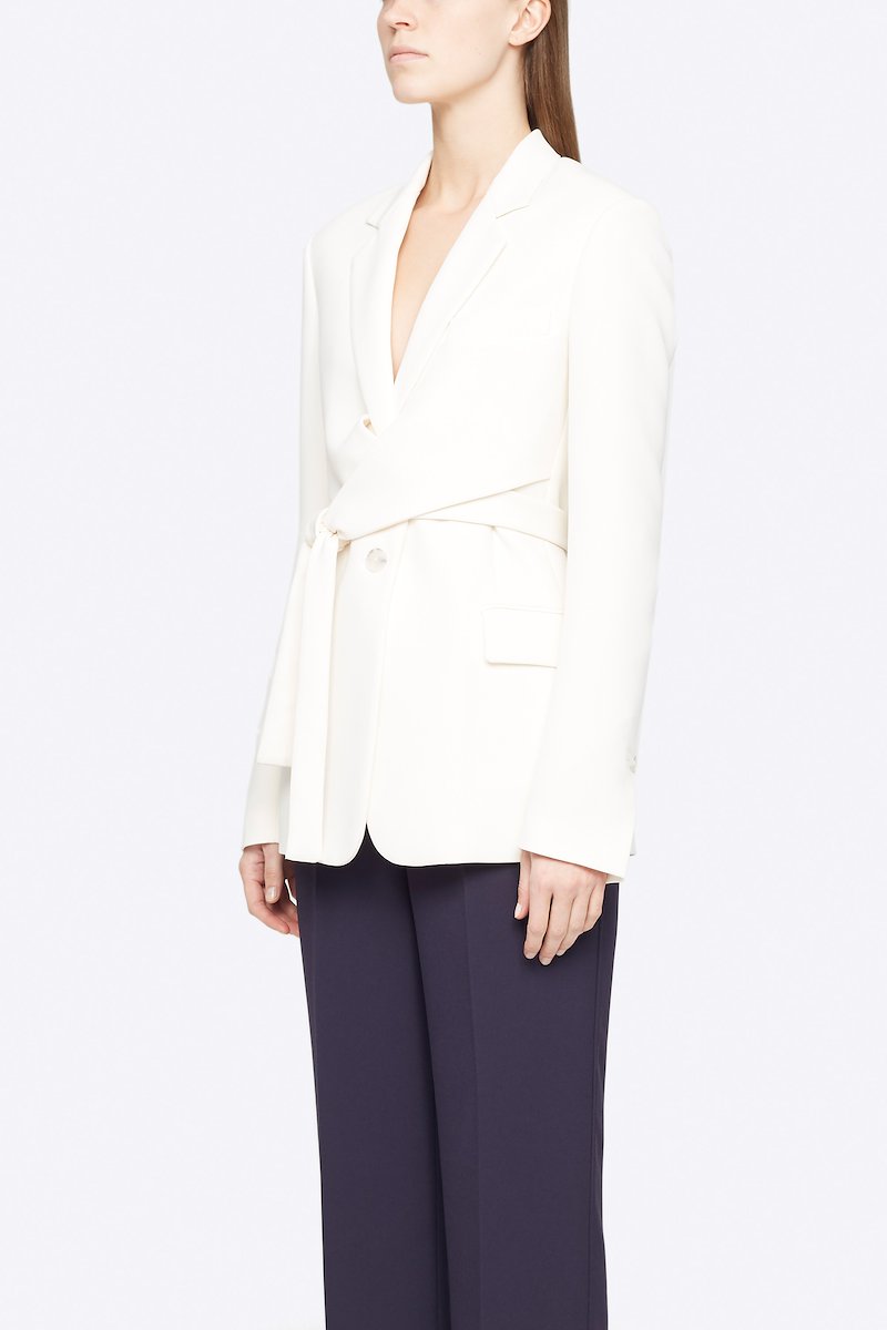 Heavy Cady Wrap Blazer-white #1 Heavy Cady Wrap Blazer, Keep it formal but never boring. Detailed with a wrap waist, this off-white single-breasted blazer from 3.1 Phillip Lim will take your business attire game to a whole new level. Ready to step up? Featuring notched lapels, a front button fastening, long sleeves, button cuffs, a chest pocket, front flap pockets and a rear central vent. POSITIVELY CONSCIOUS: This product is made with a certified eco-material or a recycled material that is better for the planet, so you can be confident you are choosing positively.- 1