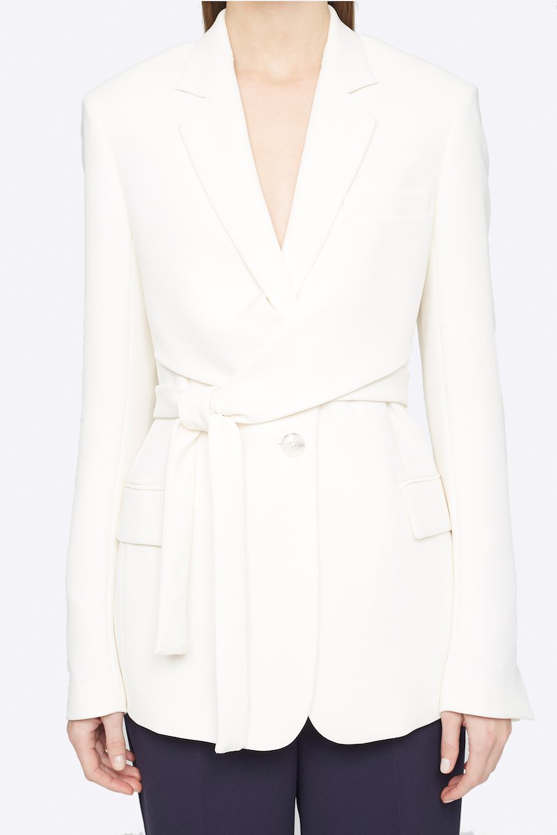 Heavy Cady Wrap Blazer-white #1 Heavy Cady Wrap Blazer, Keep it formal but never boring. Detailed with a wrap waist, this off-white single-breasted blazer from 3.1 Phillip Lim will take your business attire game to a whole new level. Ready to step up? Featuring notched lapels, a front button fastening, long sleeves, button cuffs, a chest pocket, front flap pockets and a rear central vent. POSITIVELY CONSCIOUS: This product is made with a certified eco-material or a recycled material that is better for the planet, so you can be confident you are choosing positively.- 3