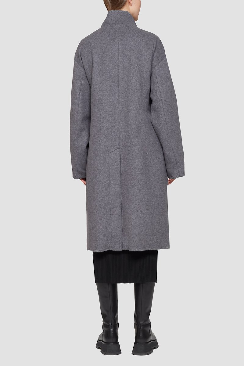 Melton Wool Blend Blanket Coat-grey #1 Melton Wool Blend Blanket Coat, Charcoal grey recycled wool-Tencel™ blend wrap blanket coat from 3.1 PHILLIP LIM featuring high neck, off-centre front button fastening, patch detail, drop shoulder, long sleeves, side slits, central rear vent and oversized style. POSITIVELY CONSCIOUS: At least 50% of the main material of this product meets our conscious criteria. For example, it's either organic, recycled, upcycled or independently recognised as being better for the environment (such as linen, ramie, TENCEL™ etc.)..- 5
